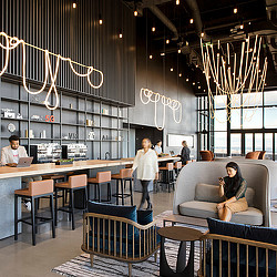 A group of people in a restaurant.